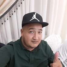 Videógrafo Yerlan Mudiyev